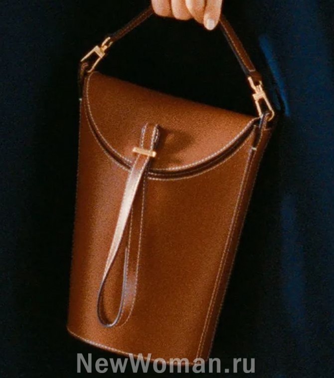 женская сумка-ведро из кожи коричневого цвета с застежкой на клапан